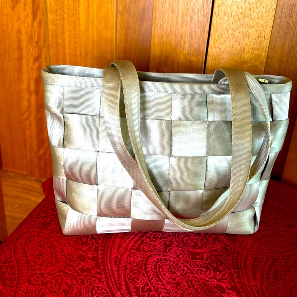 Harvey’s Seatbelt Bag, Tan woven seatbelt material.